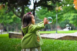 Girl playing in the park